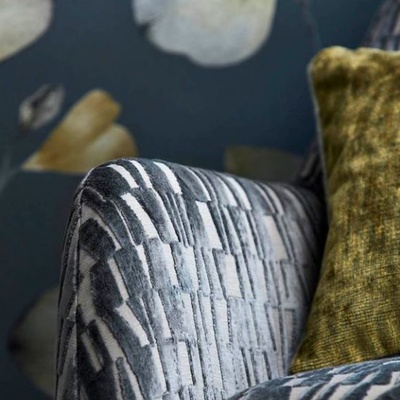 Grey block chair with green cushion Grey block chair with green cushion