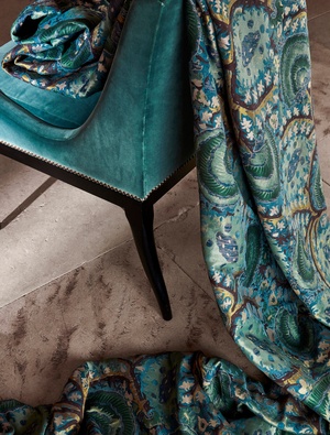 Turquoise blue fabric on chair Turquoise blue fabric on chair