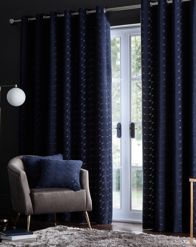 Midnight blue curtains in lounge Midnight blue curtains in lounge