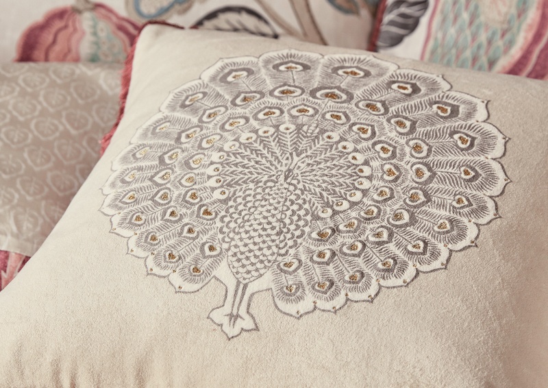 Light neutral embroidered cushion