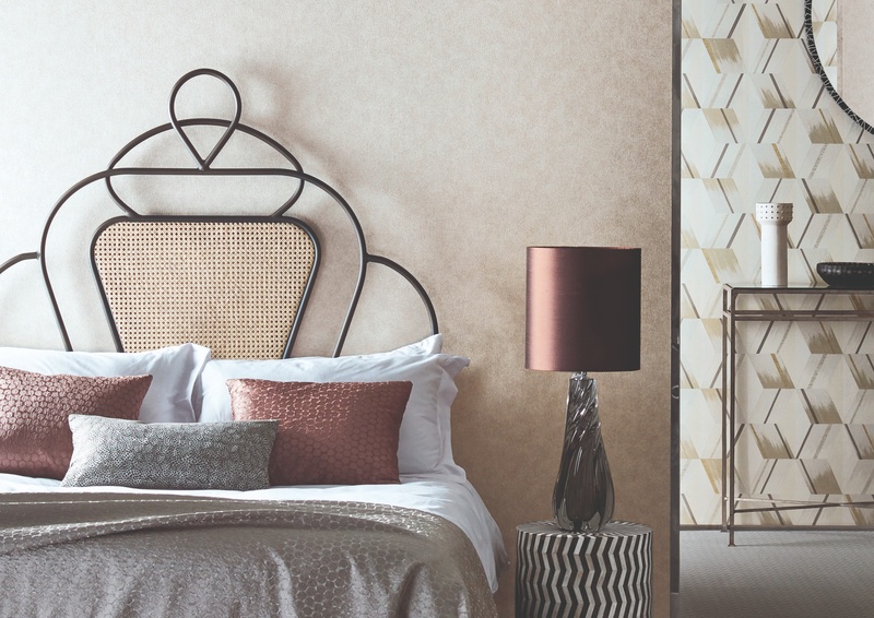 Pink, grey and white bedding in bedroom
