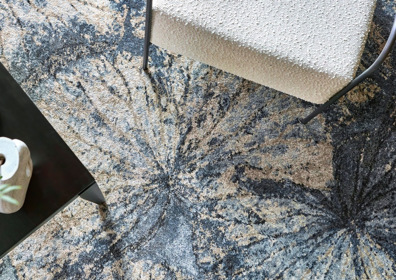 Blue and white marble effect rug close-up