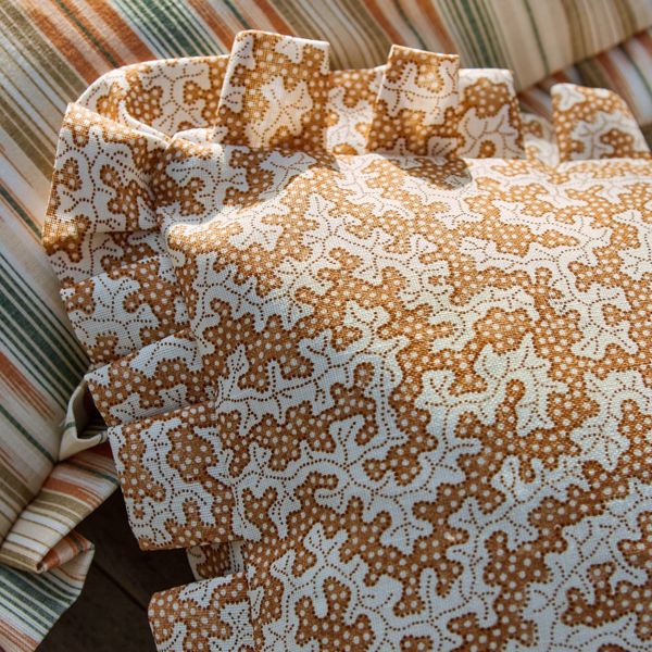 Truffle Sand Dollar Fabric by Sanderson